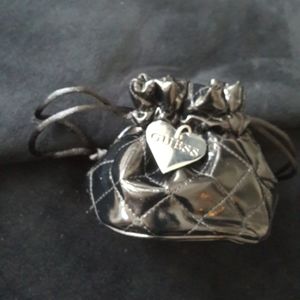 Guess. Quilted patten leather mini bag.